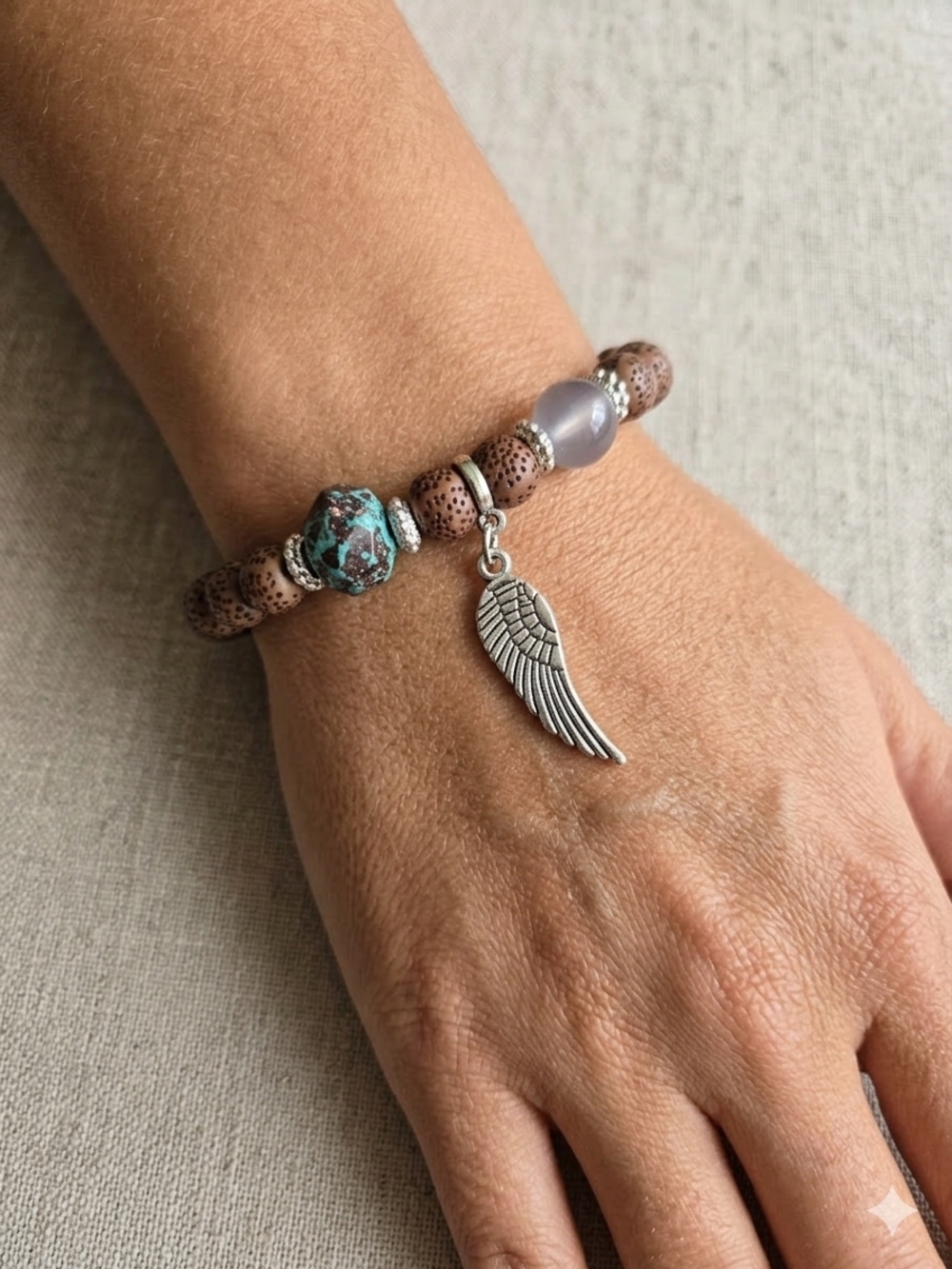 Boho Brown Beaded Stretch Bracelet with Turquoise Accent and Silver Wing Charm